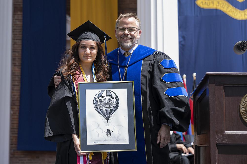 Franccesca Mamani'24 receiving the Warren Miller Blue Skies Award.