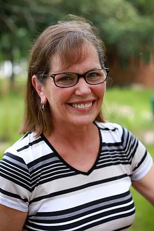 Barb Thurler smiling at the camera.