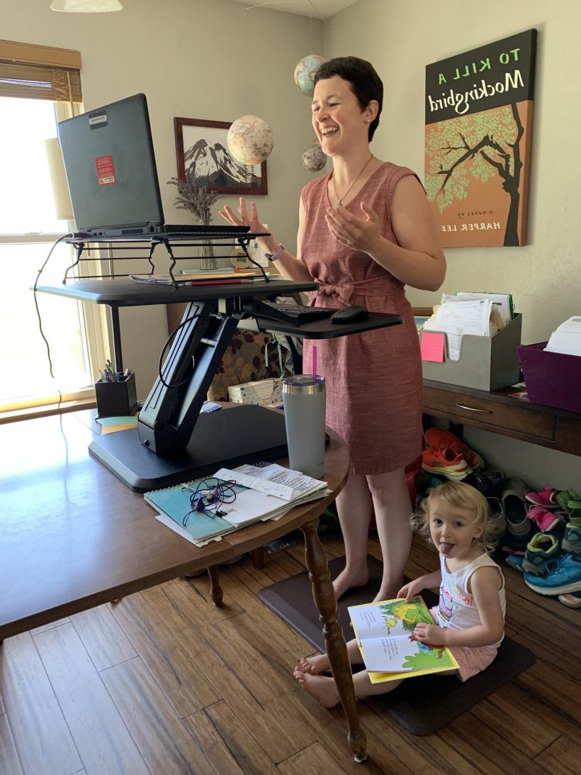 Alana Coats Rankin'05 teaches remotely with her daughter, Autumn, nearby. She's one of nearly a dozen alumni who helped their former Belo...