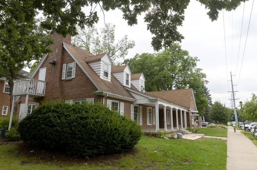 The Coughy Haus, which operates inside a former sorority house, sits at the corner of College and Clary Streets.  (Photo © Andy Manis)