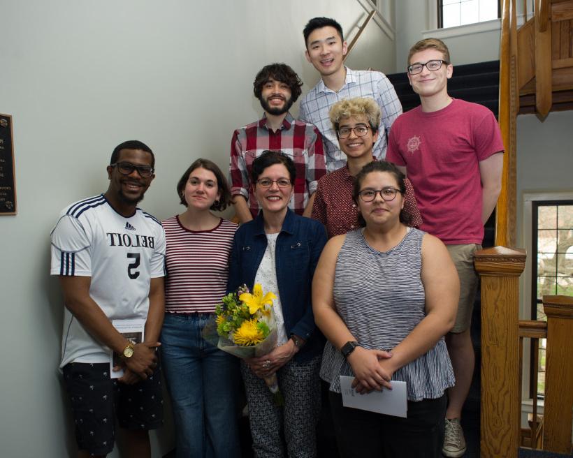 Syliva Lopez, professor of Spanish, is surrounded by her students as she received the Underkofler Award in May.